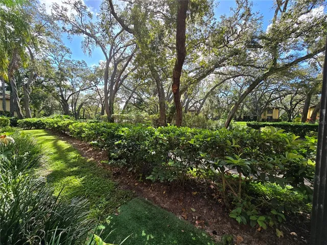 a view of outdoor space with swimming pool and furniture