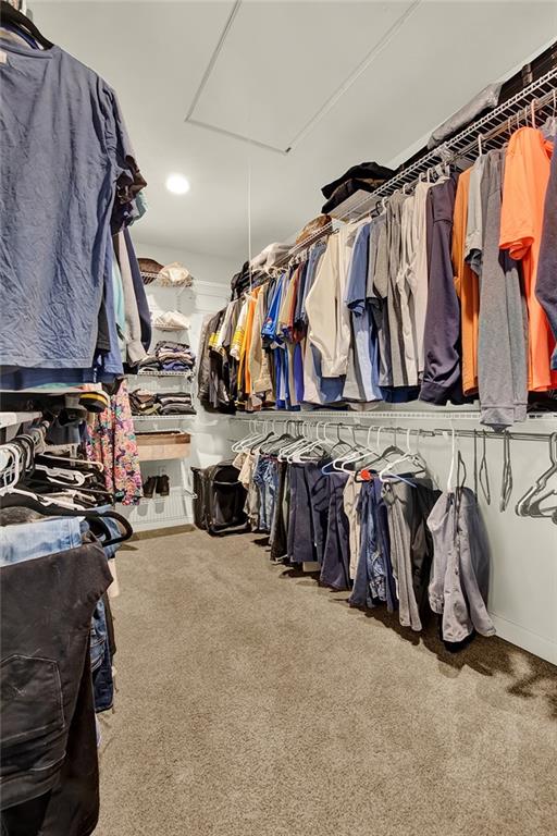 1261 Griffith Road Ligonier, PA 15658 - Photo 13 of 39 a view of walk in closet with clothes and shoes