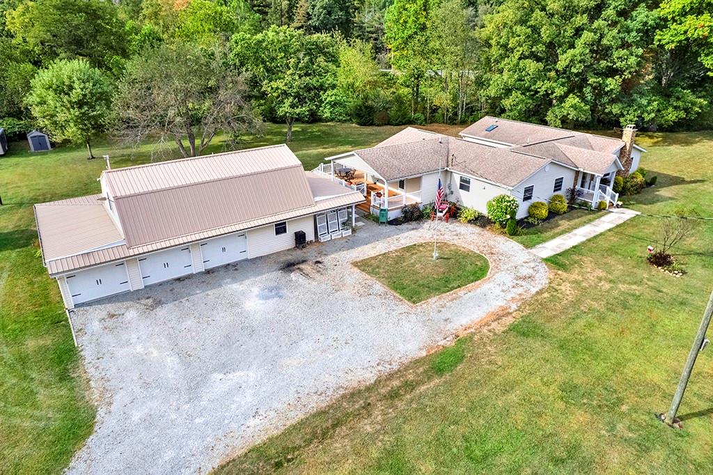 1261 Griffith Road Ligonier, PA 15658 - Photo 3 of 39 an aerial view of a house with yard swimming pool and outdoor seating