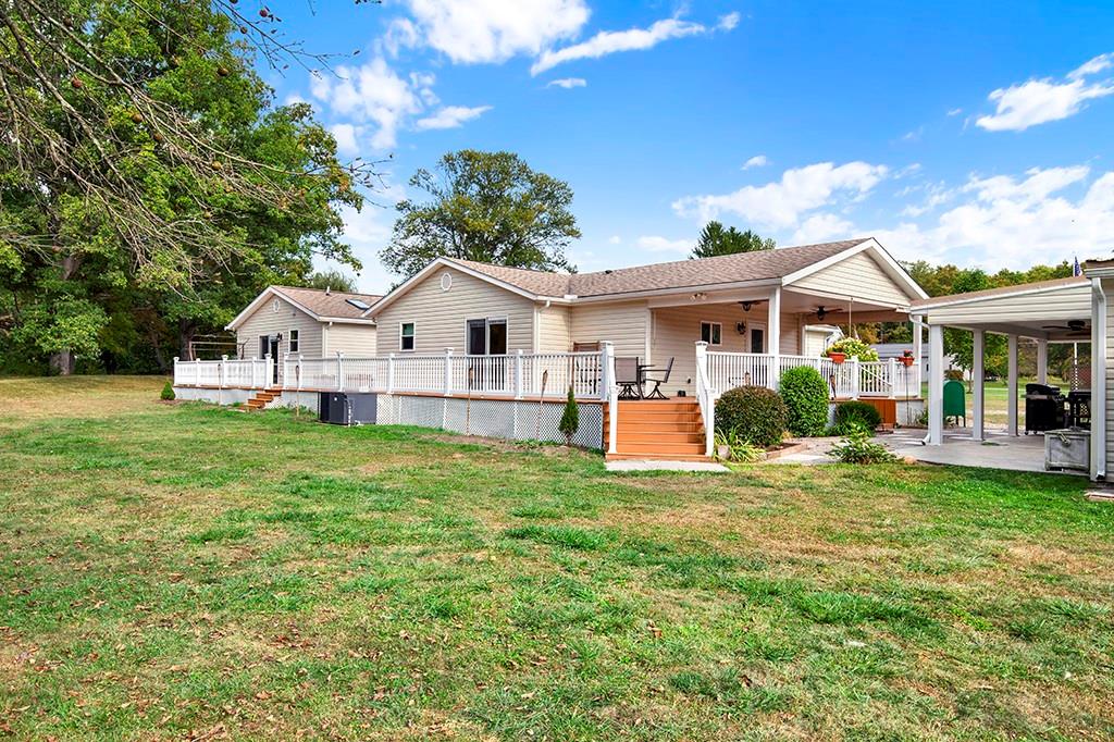 1261 Griffith Road Ligonier, PA 15658 - Photo 33 of 39 a view of a house with a big yard and potted plants