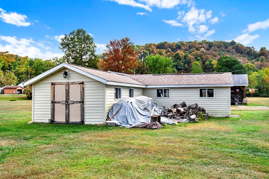 1261 Griffith Road Ligonier, PA 15658 - Photo 37 of 39 a view of a house with a yard and sitting area