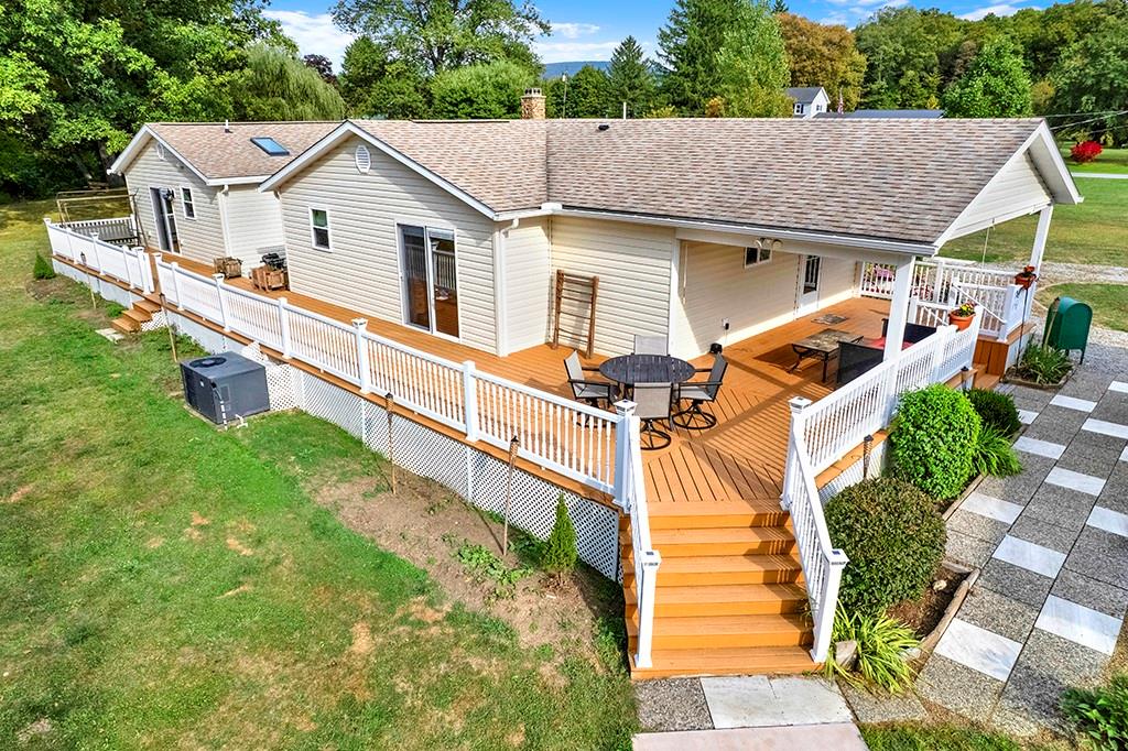 1261 Griffith Road Ligonier, PA 15658 - Photo 4 of 39 a view of a house with a yard and sitting area