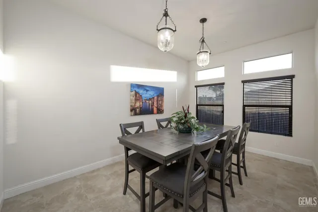 a kitchen with counter top space cabinets and stainless steel appliances