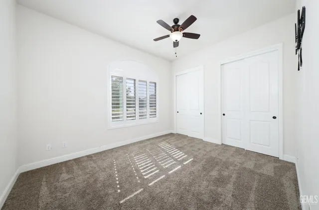 a utility room with sink dryer and washer