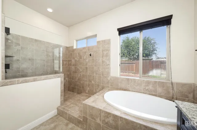 a balcony with chairs and a table