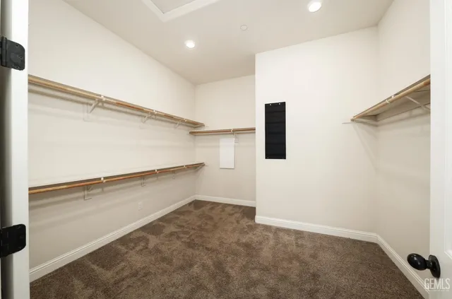 a swimming pool with wooden fence