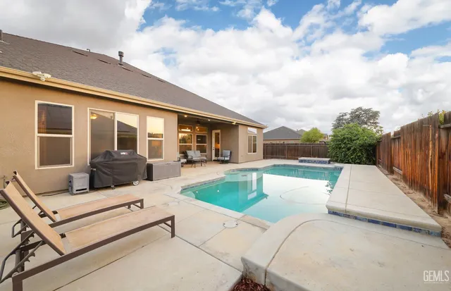 a balcony with wooden floor