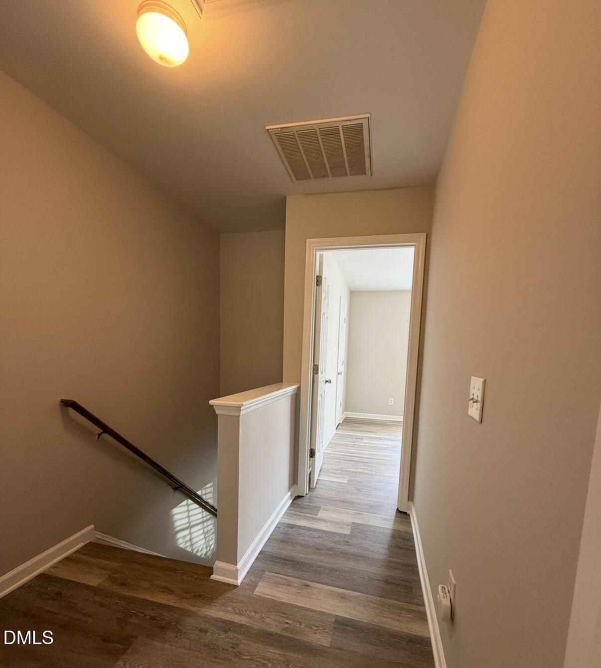 10 Red Lane Raleigh, NC 27606 - Photo 3 of 13 a view of a hallway with wooden floor