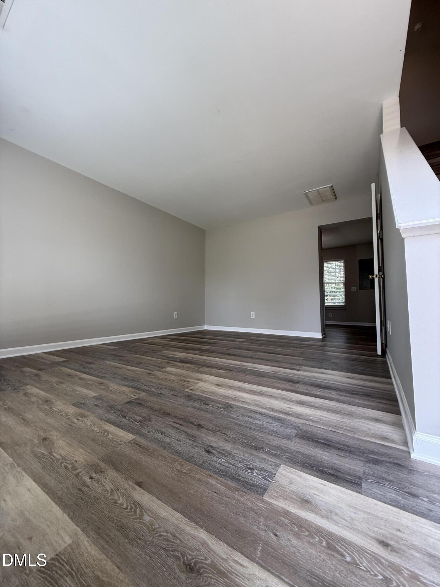10 Red Lane Raleigh, NC 27606 - Photo 4 of 13 a view of room with window and wooden floor
