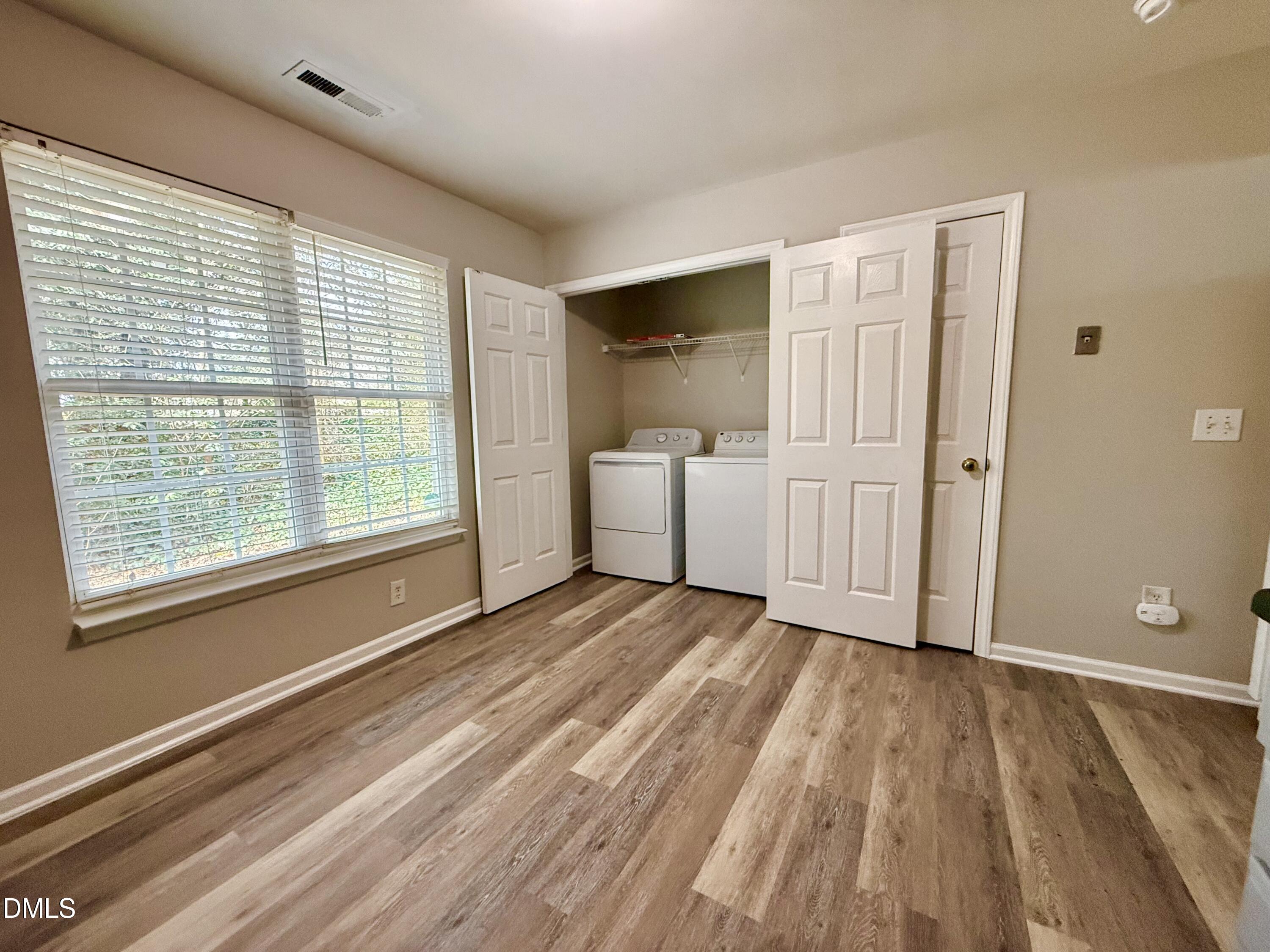 10 Red Lane Raleigh, NC 27606 - Photo 7 of 13 a view of an empty room with a window