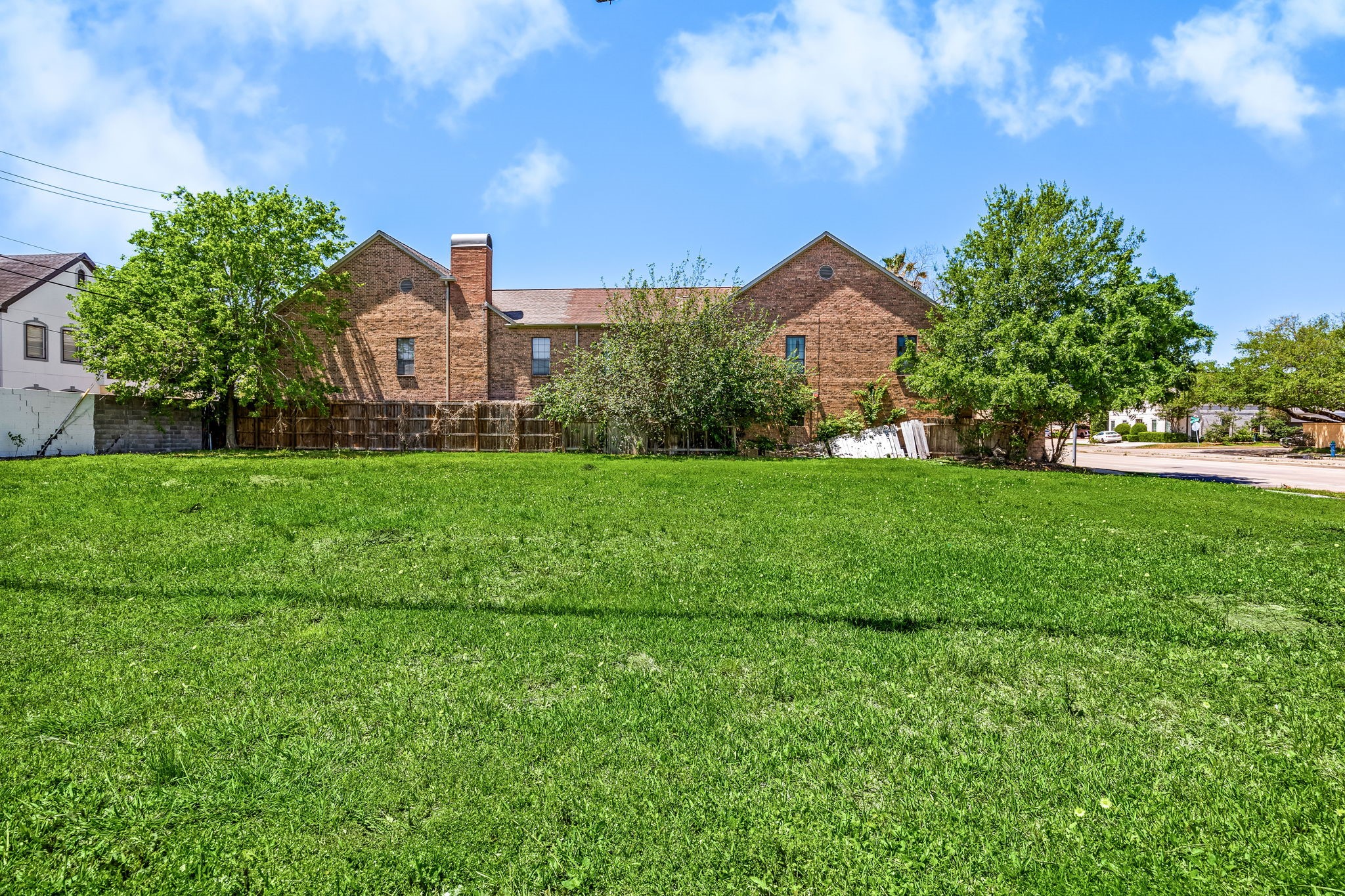 5917 San Felipe Street Houston, TX 77057 - Photo 14 of 41 a front view of a house with yard and green space