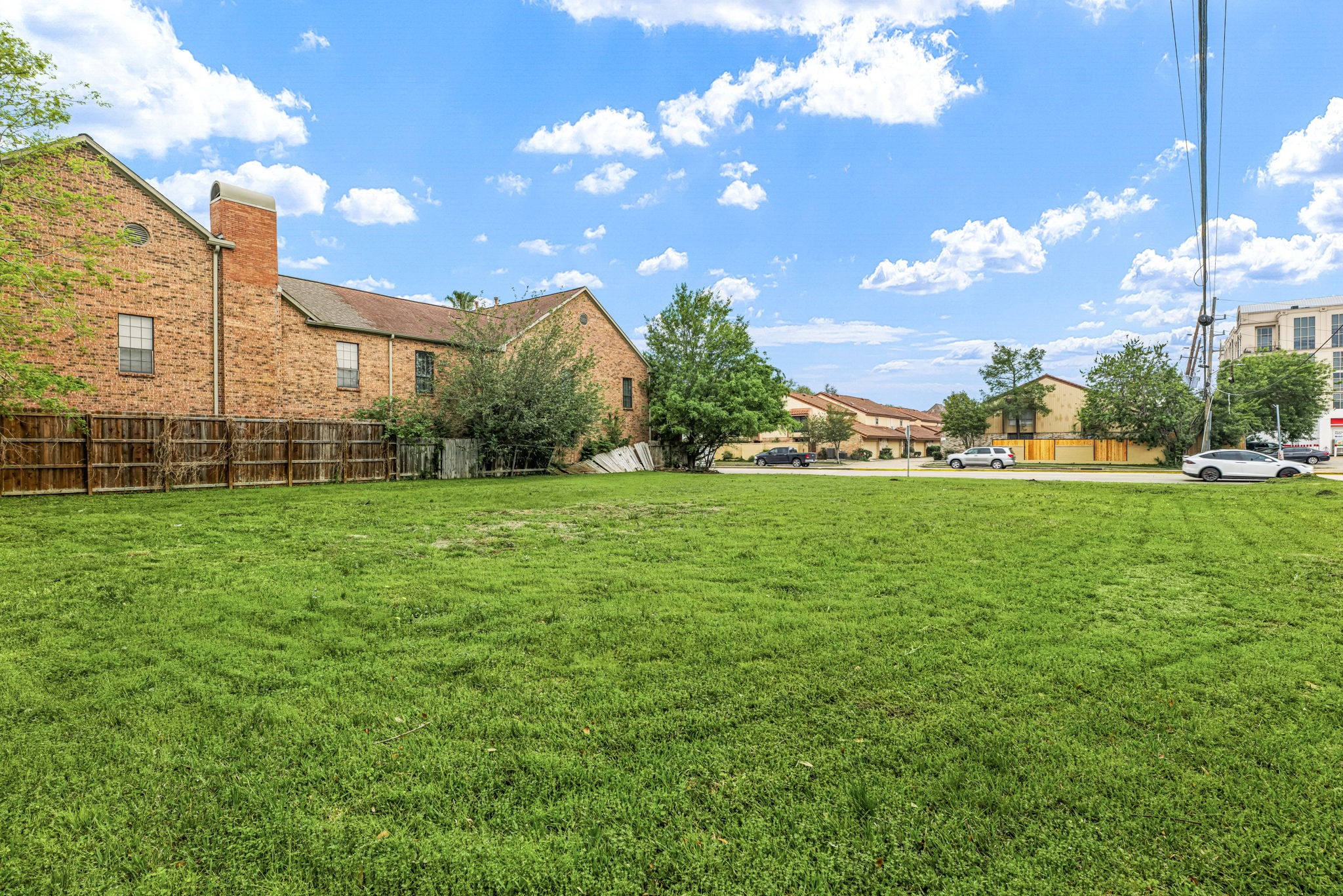 5917 San Felipe Street Houston, TX 77057 - Photo 15 of 41 a view of a building with a big yard