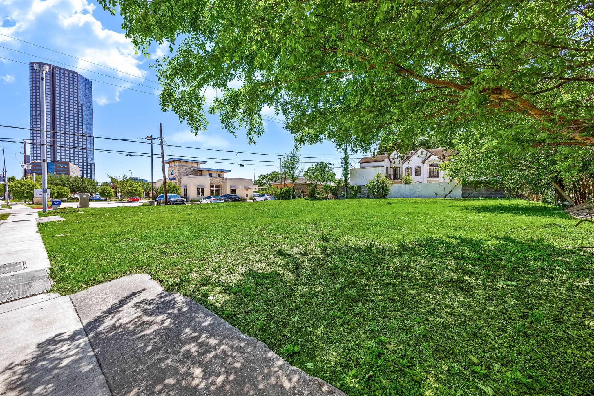 5917 San Felipe Street Houston, TX 77057 - Photo 19 of 41 a view of a house with a yard