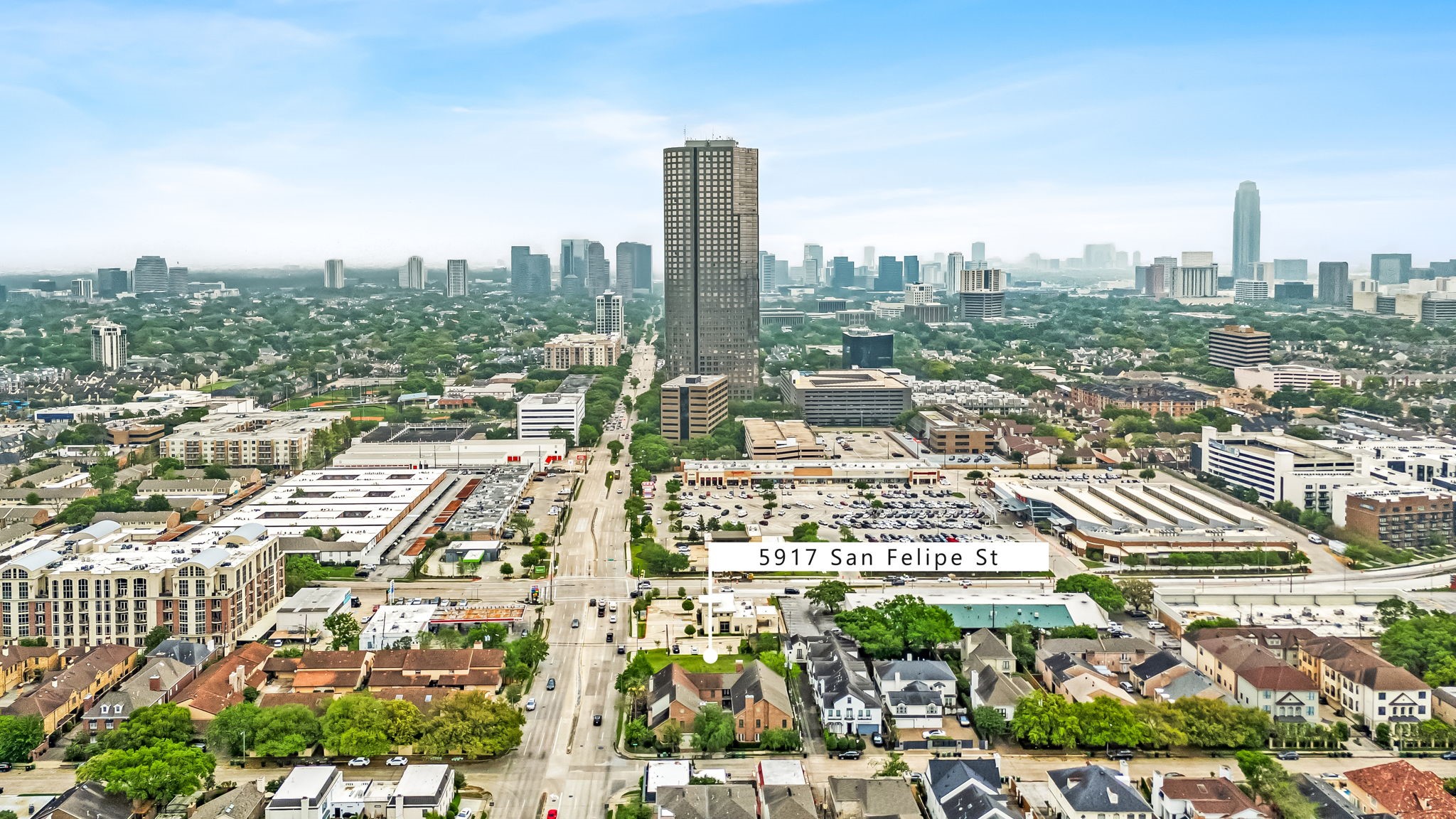 5917 San Felipe Street Houston, TX 77057 - Photo 8 of 41 a view of a city with tall buildings