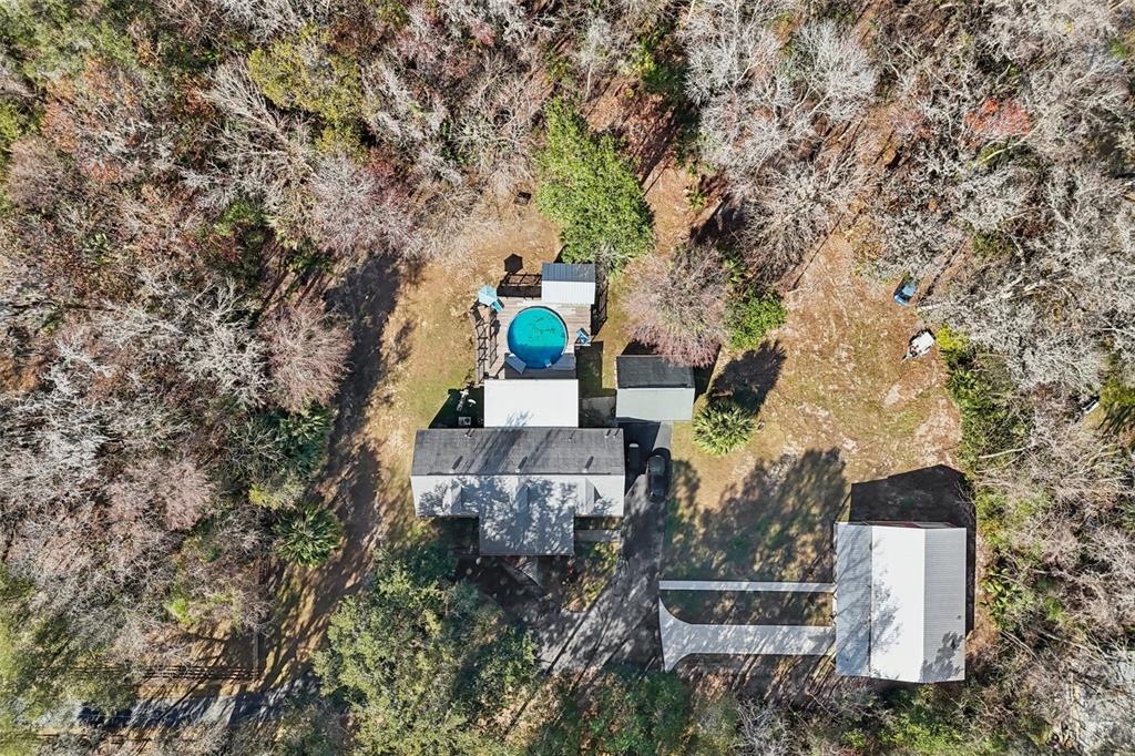 7459 Southwest 5th Avenue Ocala, FL 34476 - Photo 3 of 55 an aerial view of a house with outdoor space