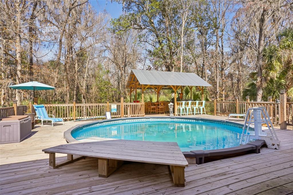 7459 Southwest 5th Avenue Ocala, FL 34476 - Photo 41 of 55 swimming pool view with a seating space