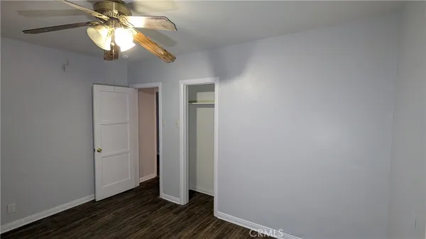 a view of a livingroom with wooden floor