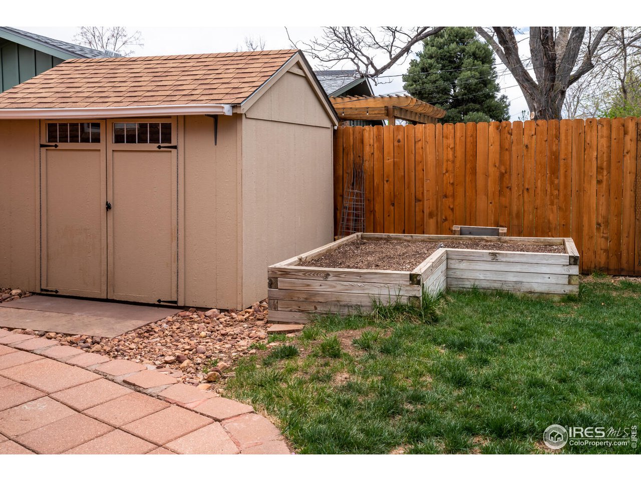 1255 Albion Road Boulder, CO 80305 - Photo 33 of 40 Storage shed and raised beds