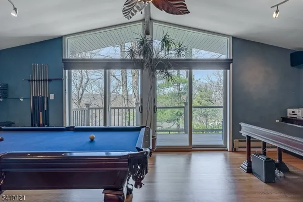 a room with furniture and a large window