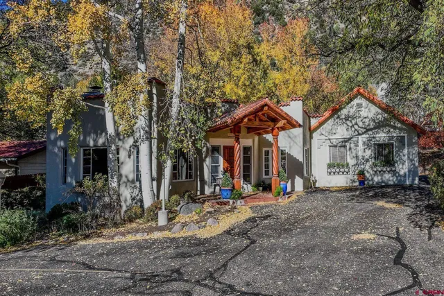 a view of a parked cars in front of a building