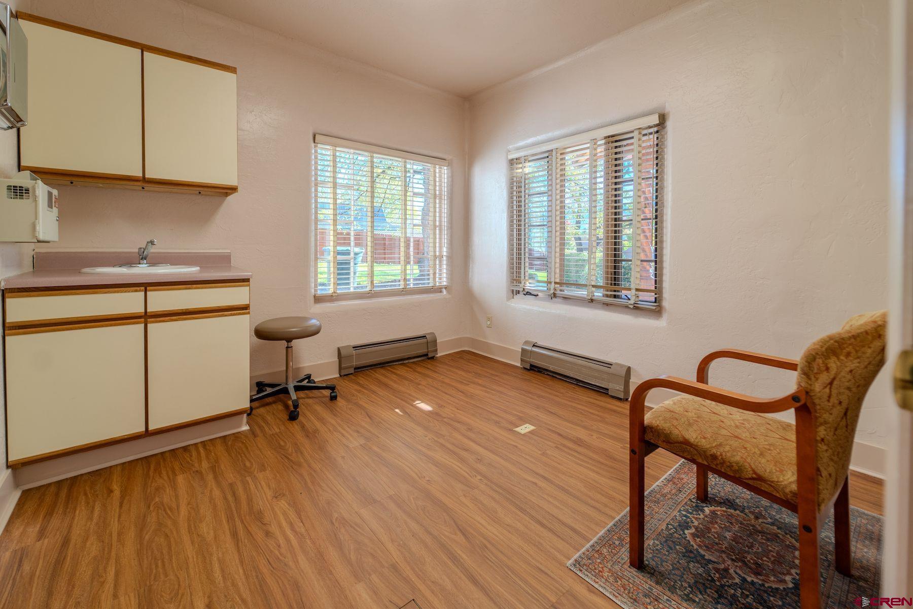 3649 Main Avenue Durango, CO 81301 - Photo 16 of 34 a view of a workspace with furniture and a window