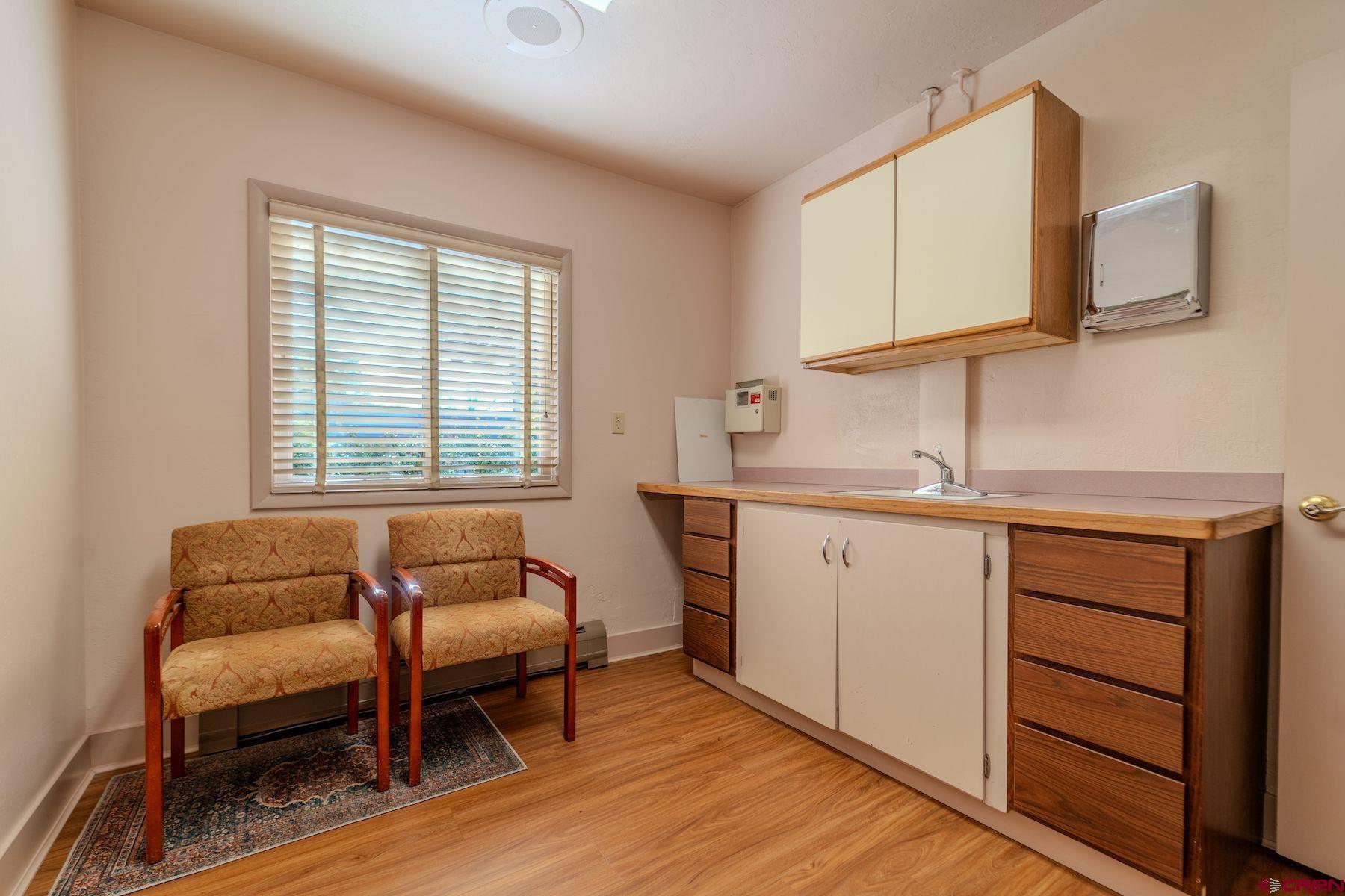 3649 Main Avenue Durango, CO 81301 - Photo 22 of 34 a bedroom with a bed and a dresser