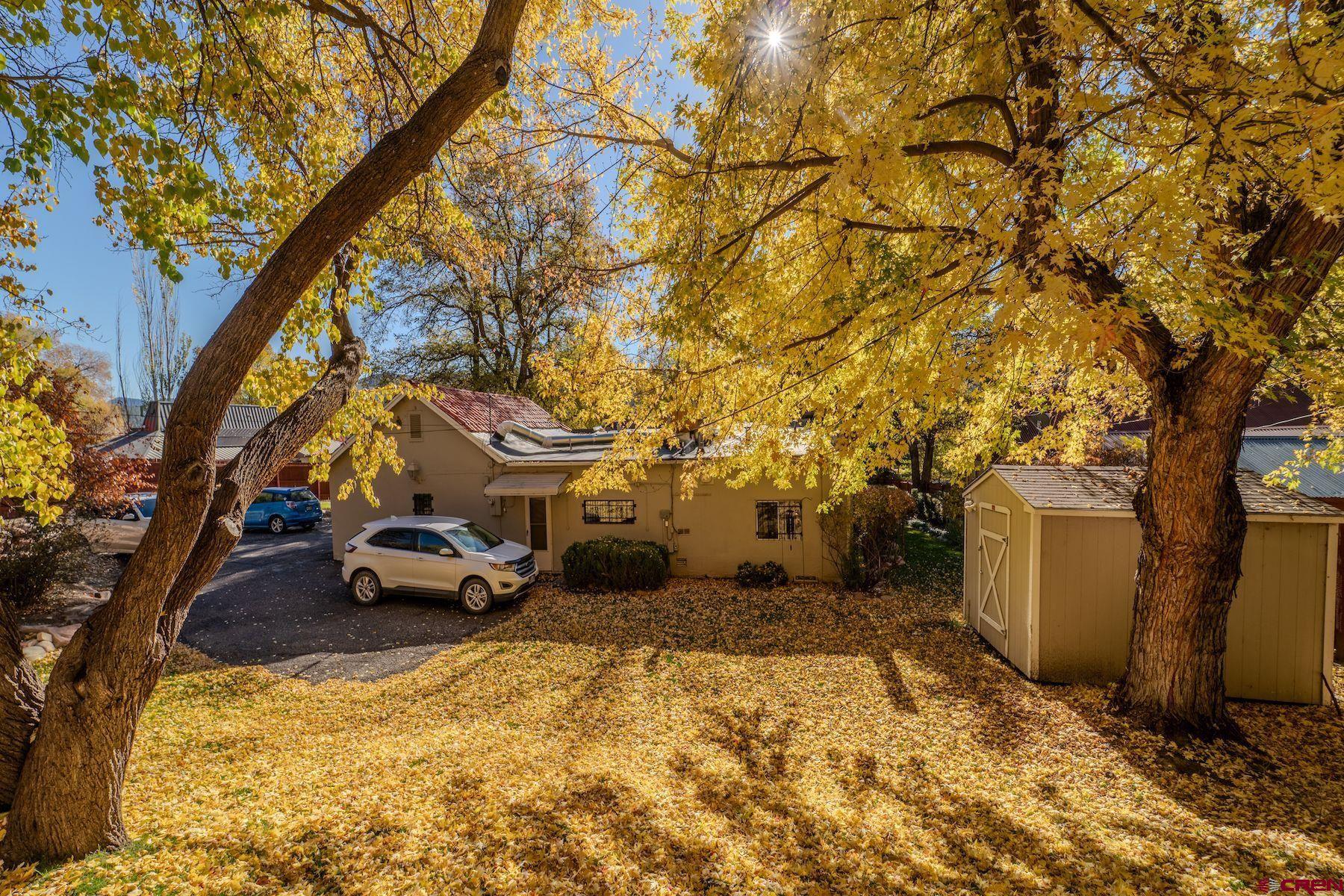 3649 Main Avenue Durango, CO 81301 - Photo 28 of 34 a view of a yard with cars