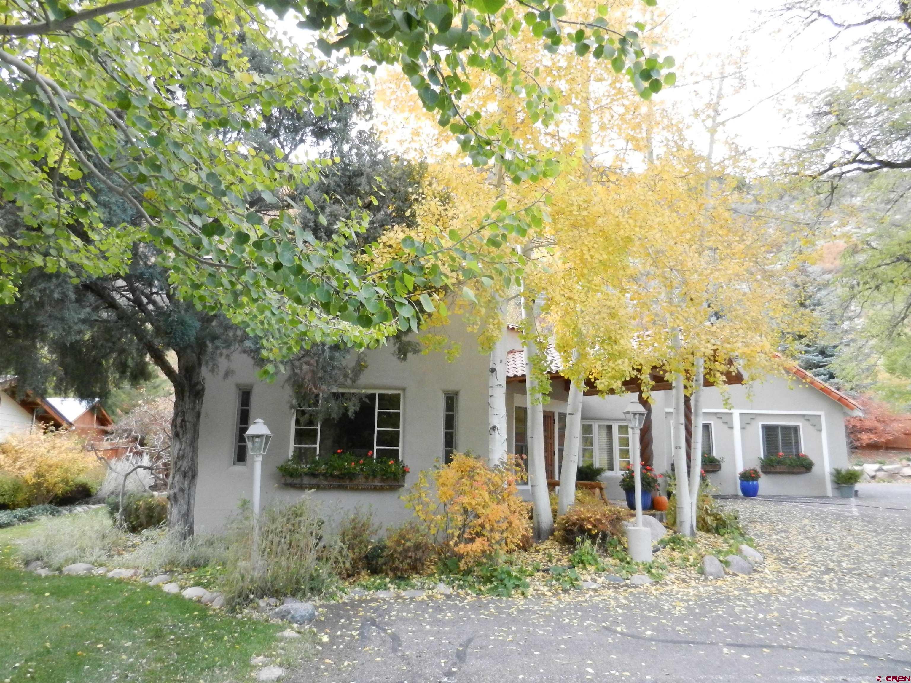 3649 Main Avenue Durango, CO 81301 - Photo 33 of 34 a front view of a house with garden