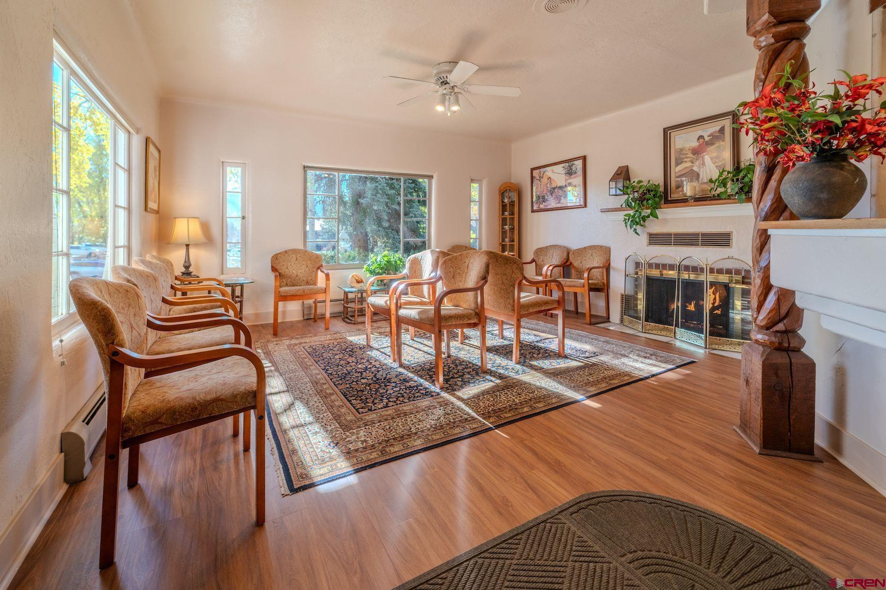 3649 Main Avenue Durango, CO 81301 - Photo 6 of 34 a living room with furniture fireplace and flat screen tv