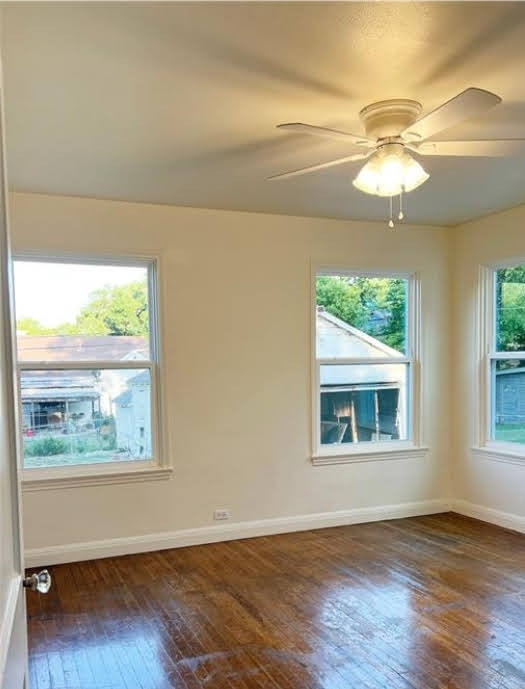 809 North 8th Street Temple, TX 76501 - Photo 11 of 20 Hardwood floors and generous natural light create an inviting atmosphere.