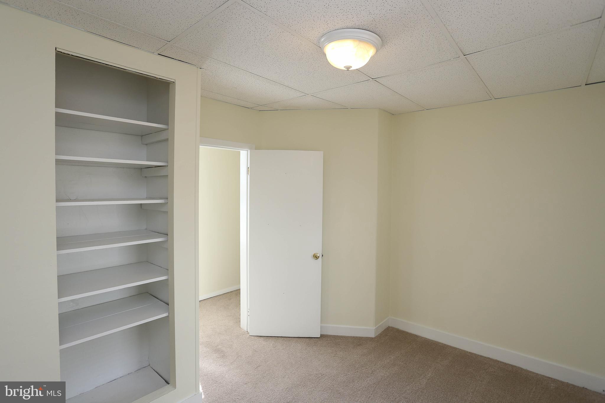216 Clyde Avenue Halethorpe, MD 21227 - Photo 13 of 49 a view of an empty room with a window
