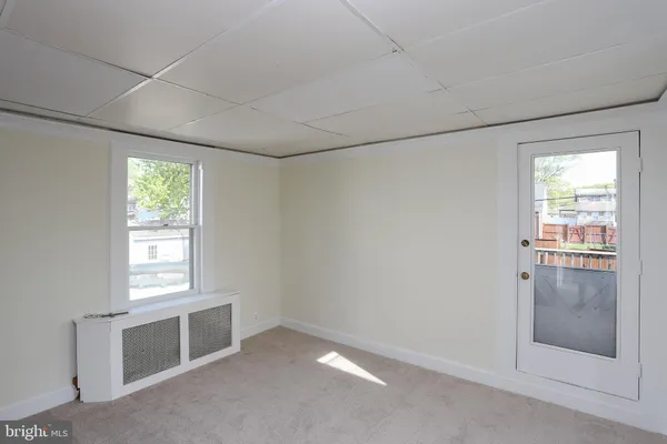 a view of an empty room with window