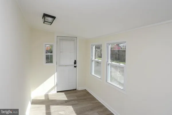 a view of storage and utility room with washer and dryer