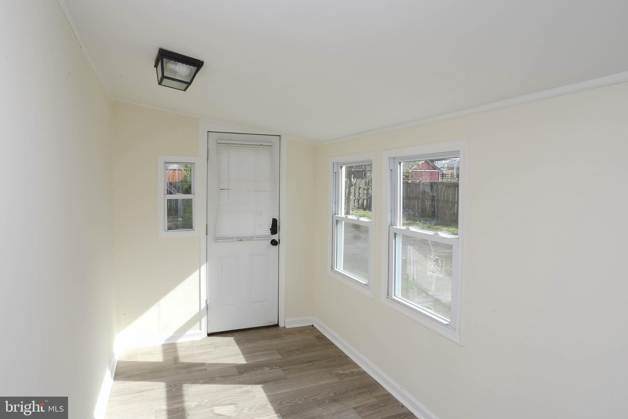 216 Clyde Avenue Halethorpe, MD 21227 - Photo 17 of 49 a view of an empty room with window
