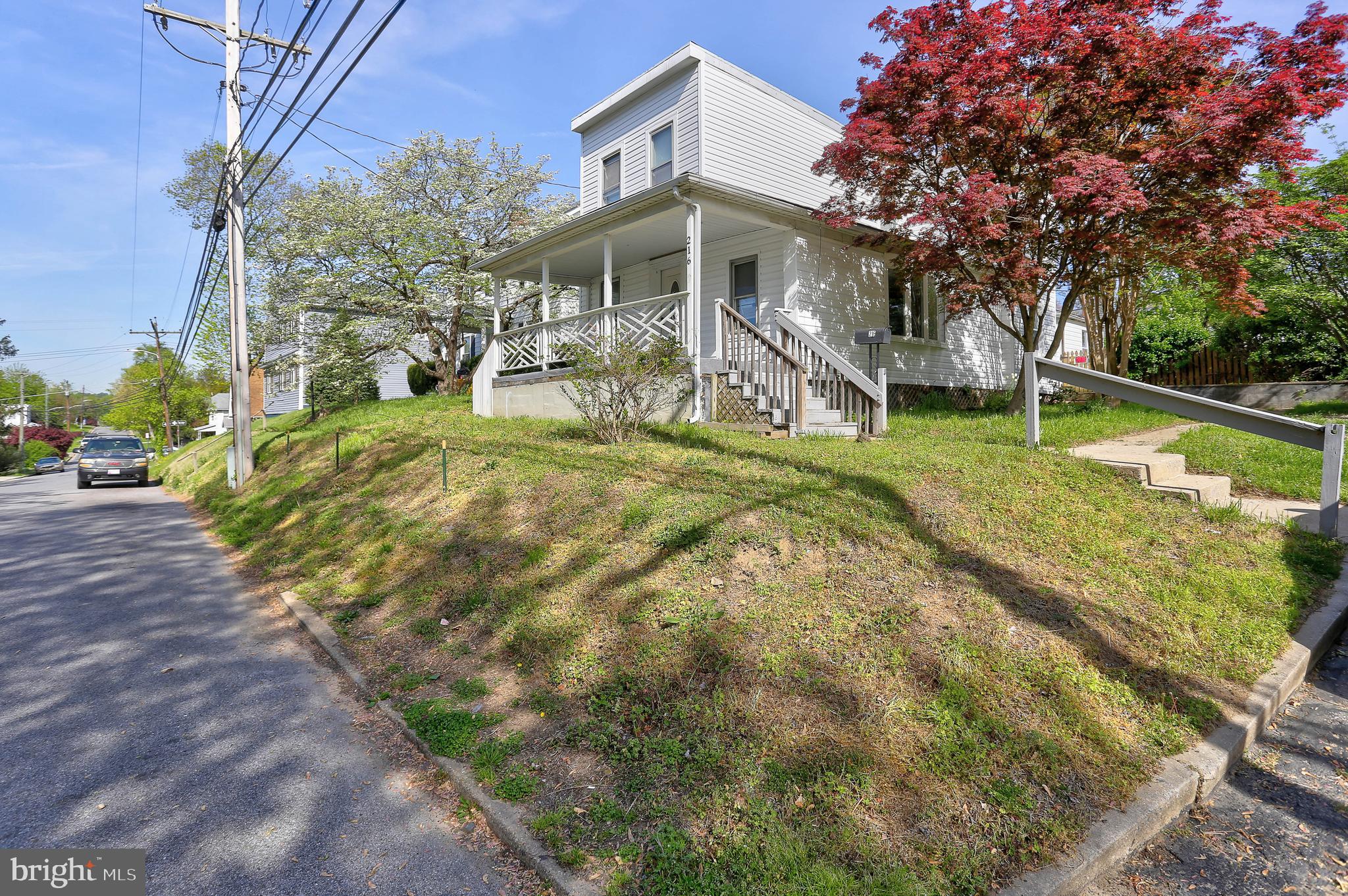 216 Clyde Avenue Halethorpe, MD 21227 - Photo 2 of 49 a view of a house with a yard