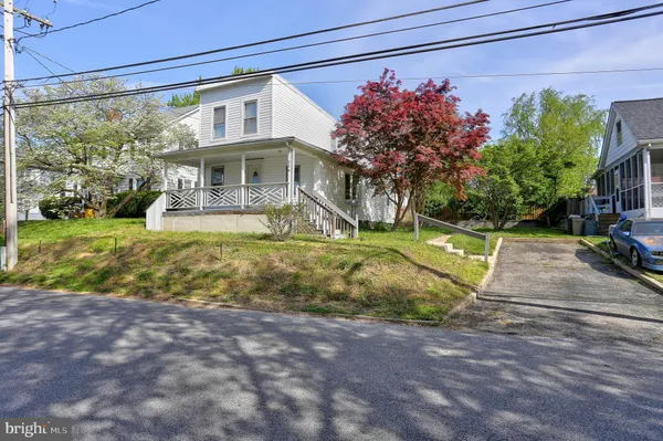 a view of a house with a big yard