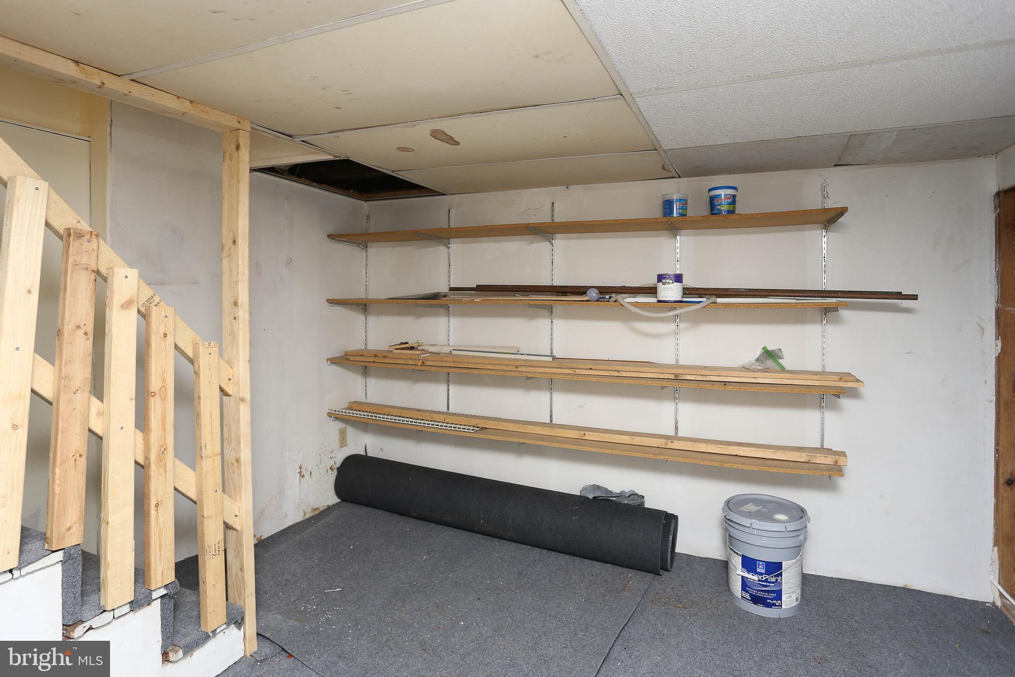 216 Clyde Avenue Halethorpe, MD 21227 - Photo 34 of 49 a view of room with racks on the wall