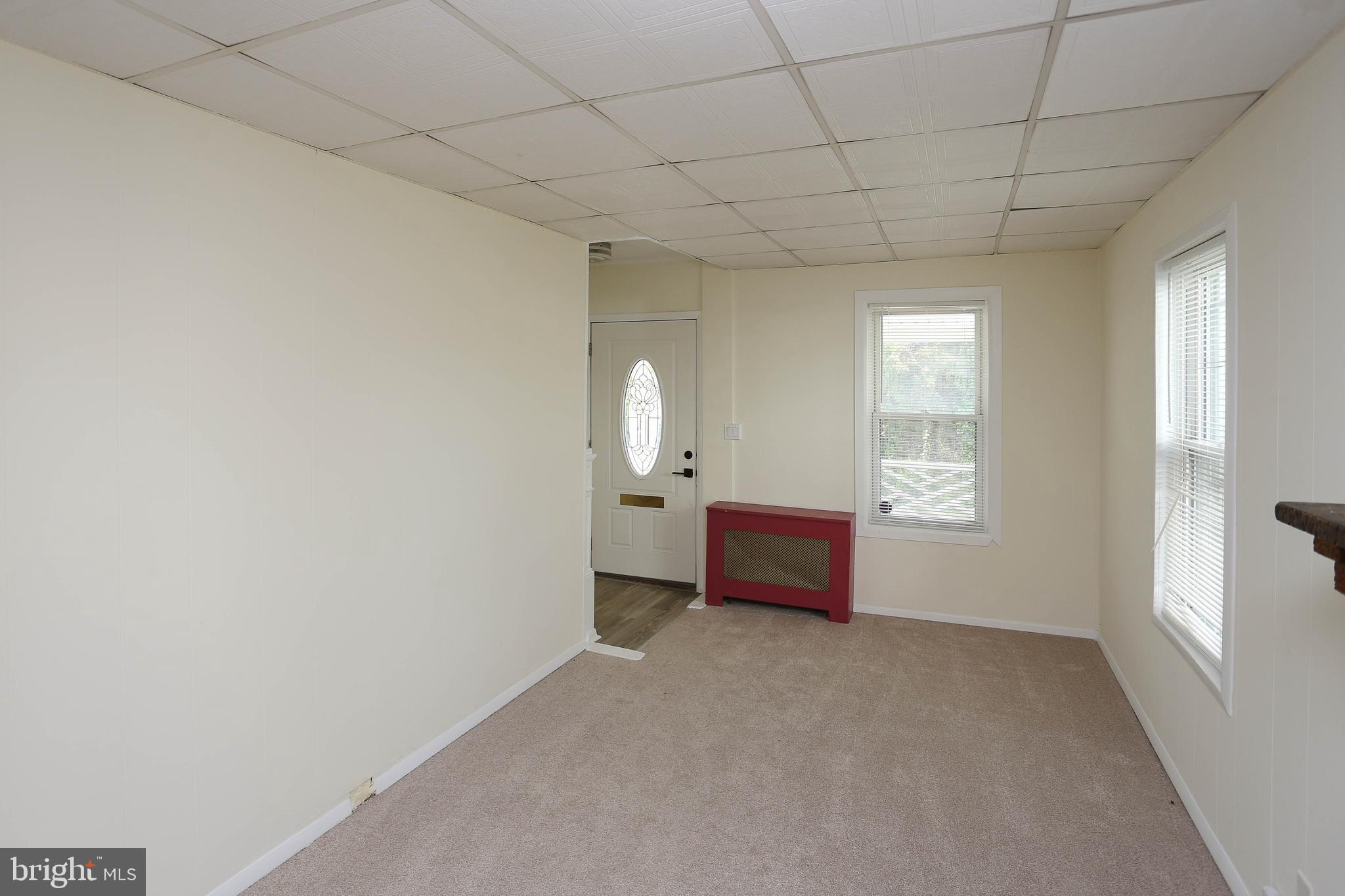 216 Clyde Avenue Halethorpe, MD 21227 - Photo 35 of 49 an empty room with windows