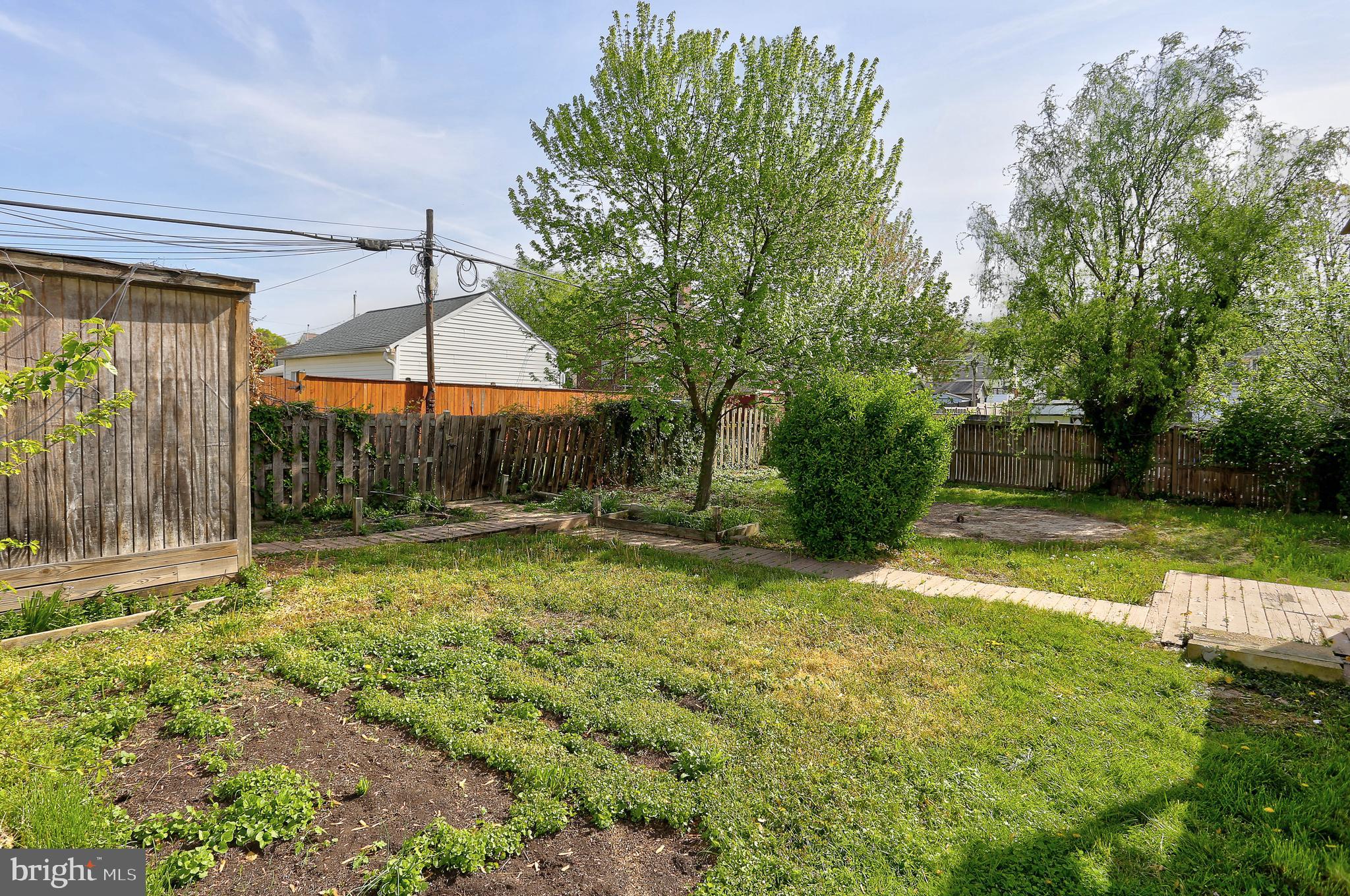 216 Clyde Avenue Halethorpe, MD 21227 - Photo 38 of 49 a backyard of a house with yard and trampoline