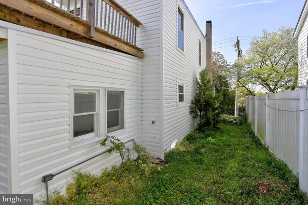 a view of a backyard of the house