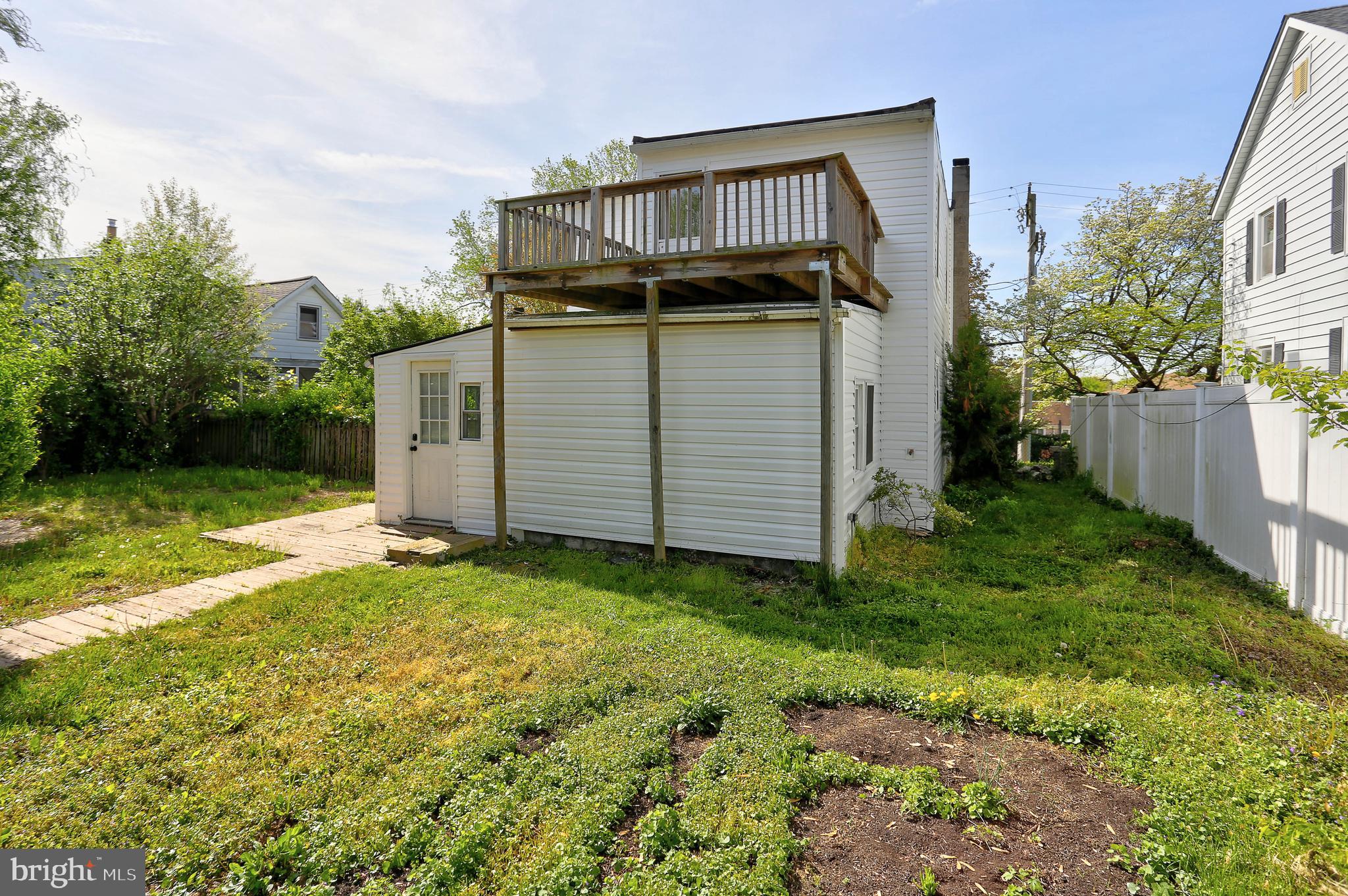 216 Clyde Avenue Halethorpe, MD 21227 - Photo 45 of 49 a view of a house with backyard and garden