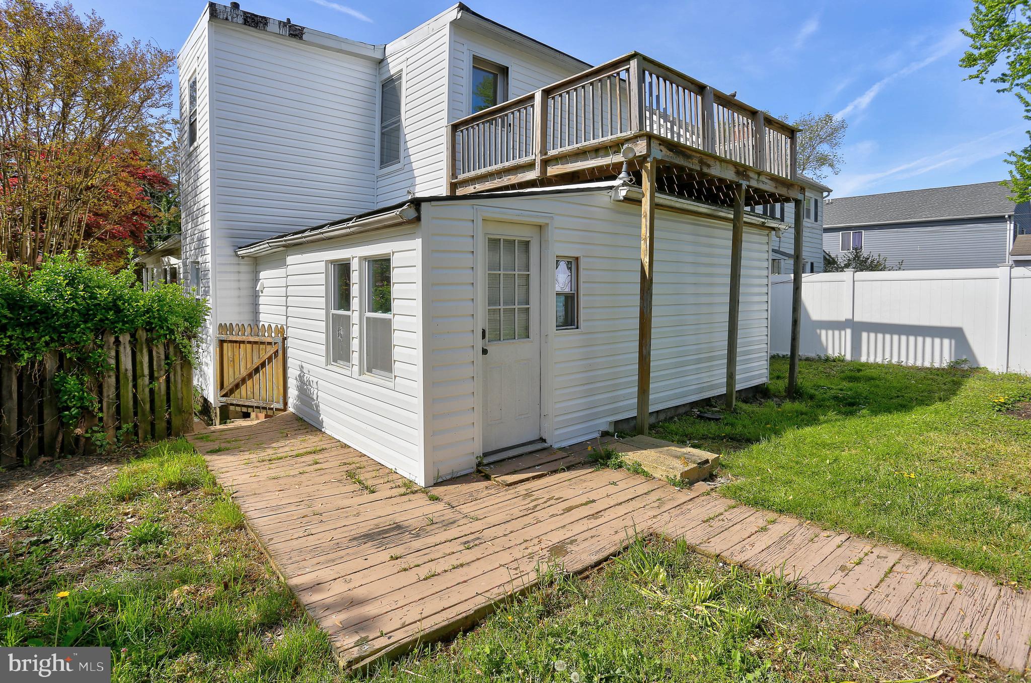 216 Clyde Avenue Halethorpe, MD 21227 - Photo 46 of 49 a view of a house with a yard