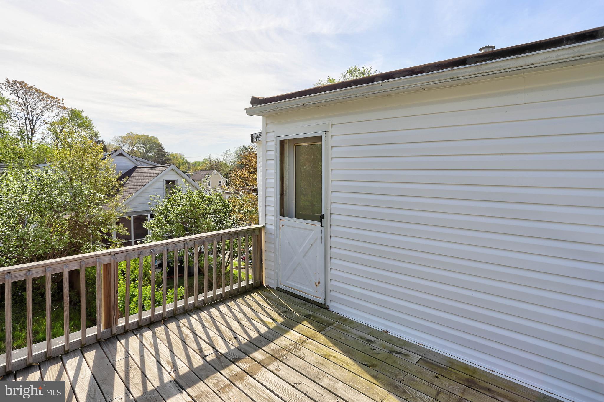216 Clyde Avenue Halethorpe, MD 21227 - Photo 47 of 49 a view of a balcony with wooden floor