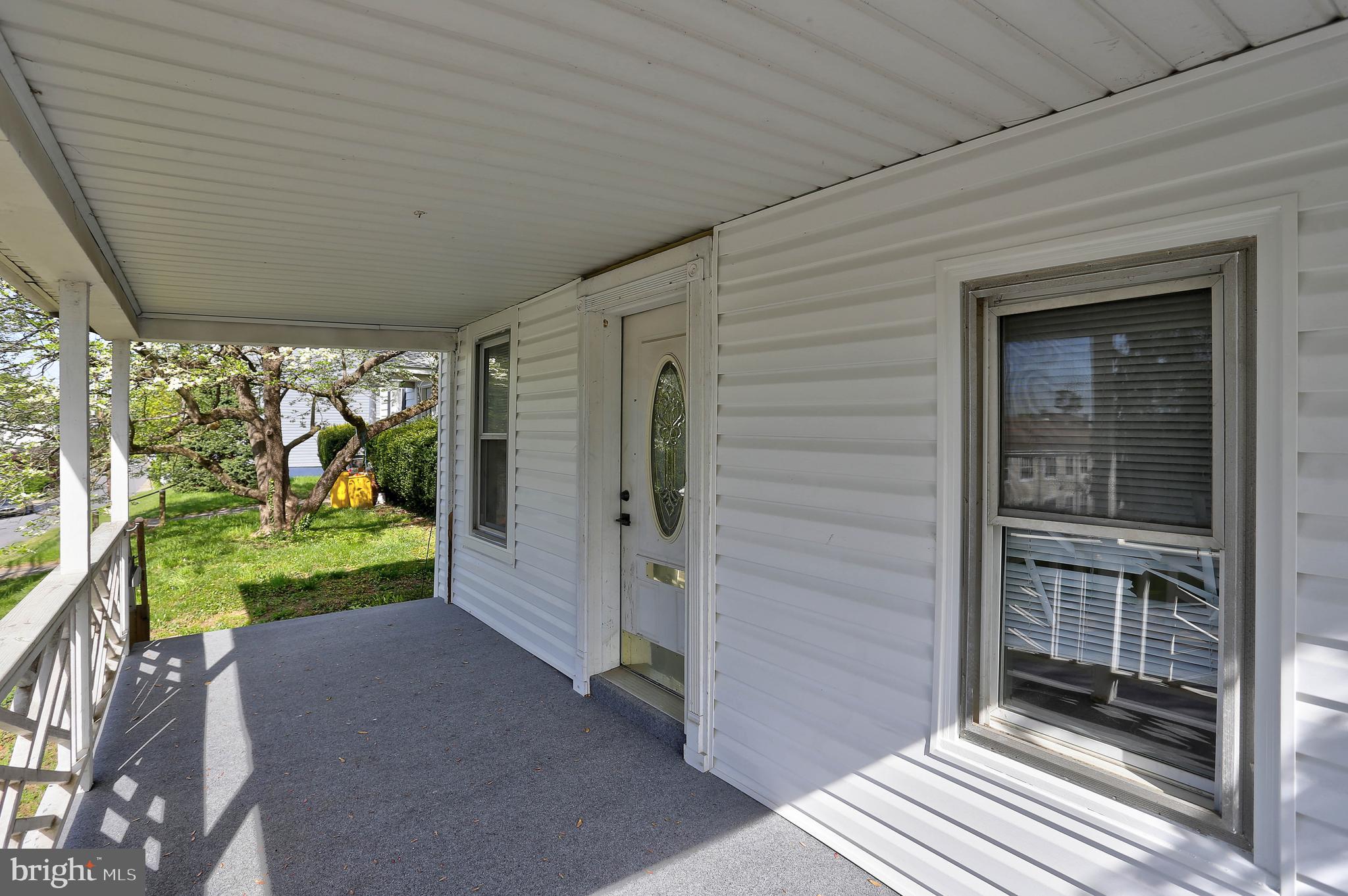 216 Clyde Avenue Halethorpe, MD 21227 - Photo 6 of 49 a view of a porch