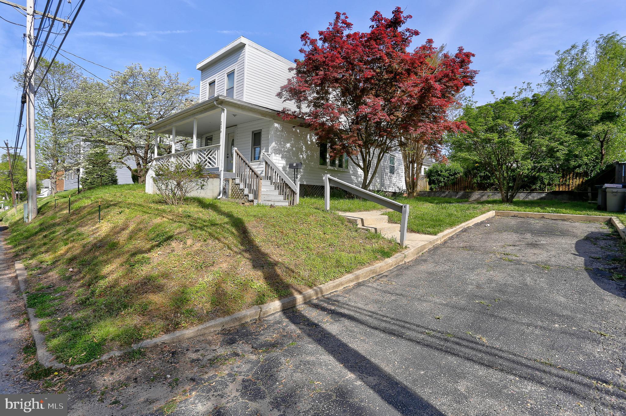216 Clyde Avenue Halethorpe, MD 21227 - Photo 8 of 49 a view of a house with yard and a garden