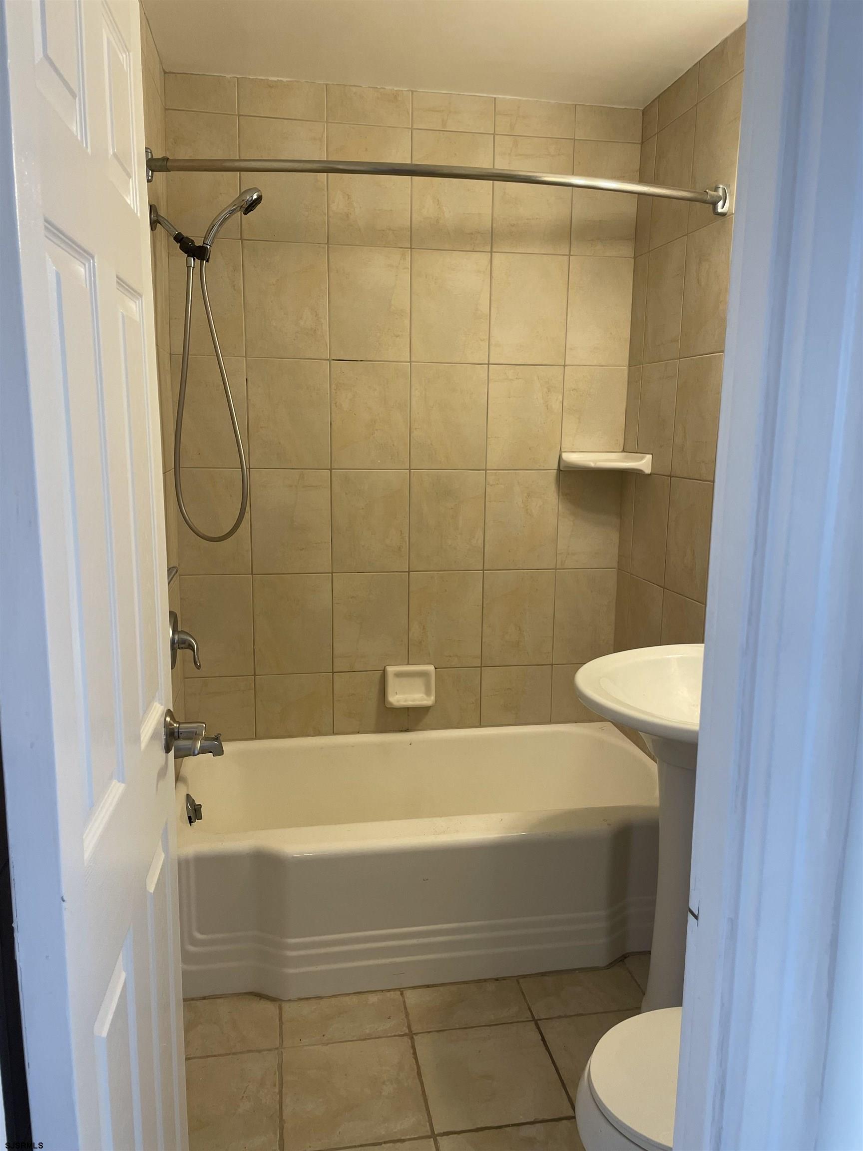 101 South Raleigh Avenue, Unit 618 Atlantic City, NJ 08401 - Photo 13 of 26 a bathroom with a toilet and a shower