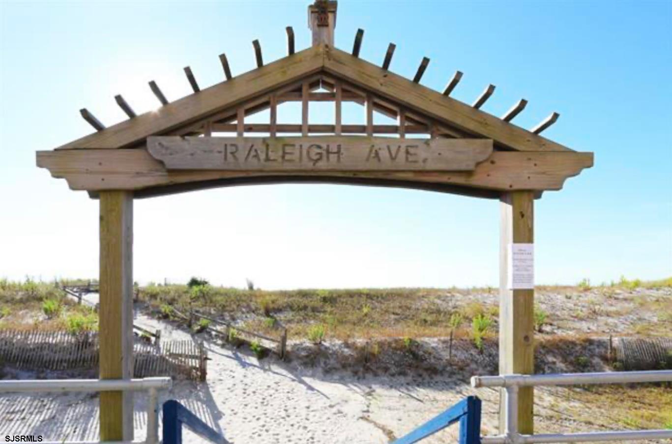 101 South Raleigh Avenue, Unit 618 Atlantic City, NJ 08401 - Photo 25 of 26 a front view of a house with a yard