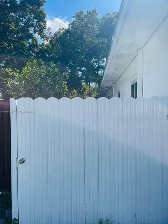 a view of a wooden fence