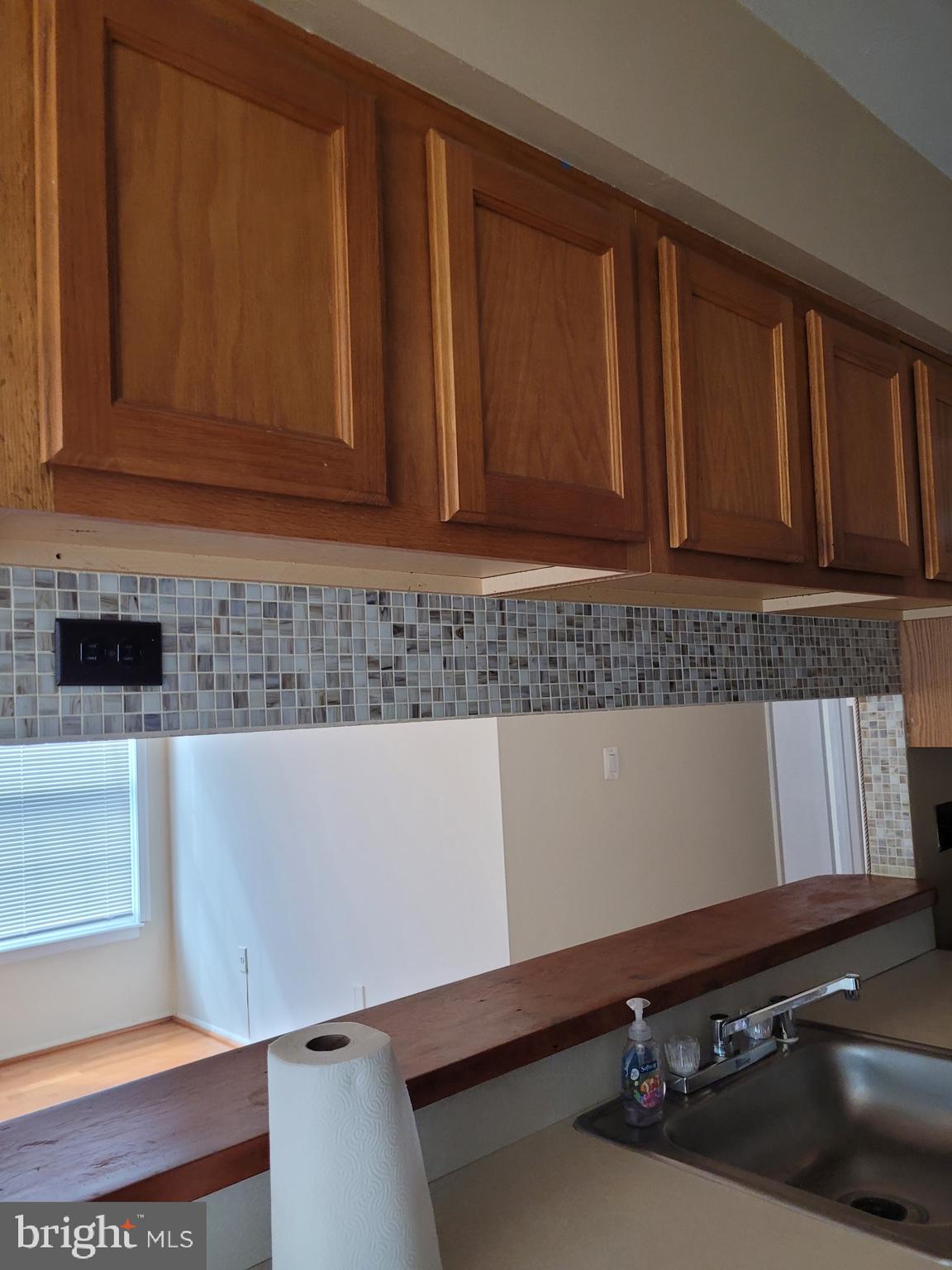 3247 Chester Grove Road Upper Marlboro, MD 20774 - Photo 6 of 17 a view of wooden cabinets