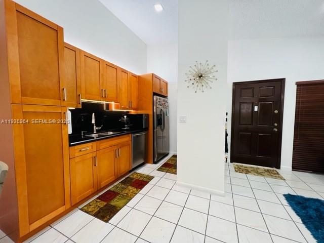 7415 Southwest 153rd Court, Unit 2047 Miami, FL 33193 - Photo 15 of 30 a view of a kitchen